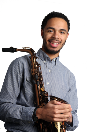 Student holding a saxophone.